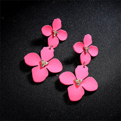 Elegant hot pink flower dangle earrings with crystal details, made of rose enamel and cubic zirconia, gold-plated finish.