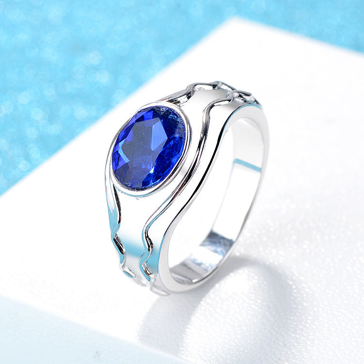 Blue Oval Crystal and Silver-Plated Band Ring, silver statement rings for women, vintage-inspired design, side view