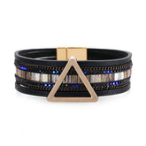 Black leather bracelet featuring a triangle design with an 18K gold-plated metal clasp for a stylish touch.