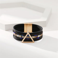 Elegant black leather bracelet with a triangle motif and a chic 18K gold-plated clasp, perfect for any outfit.