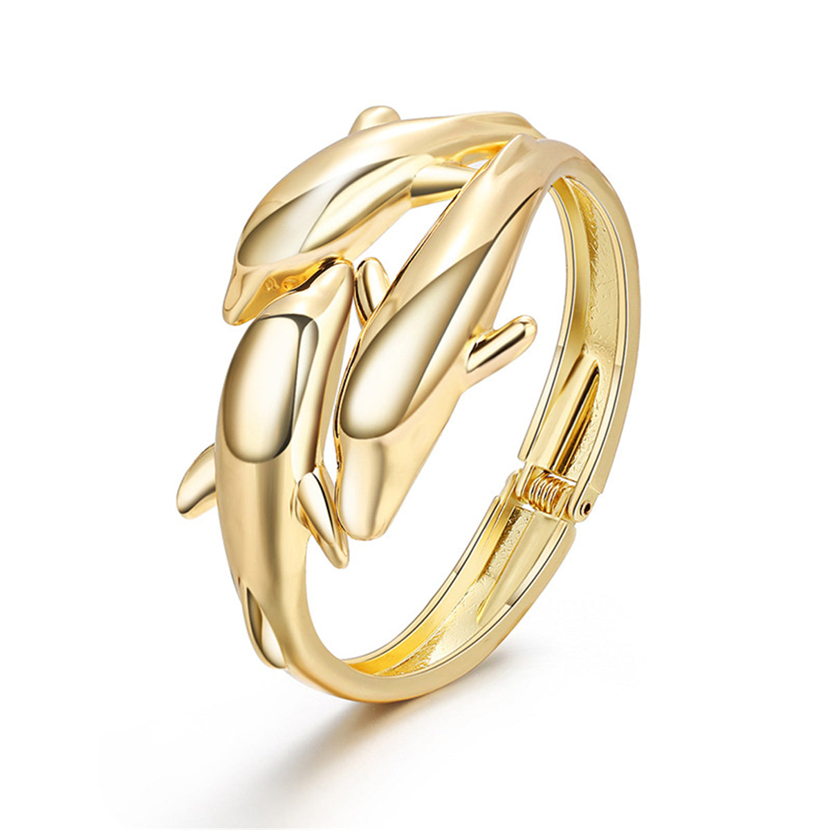 A gold-plated bracelet featuring a tri-dolphin design, elegantly bypassing the wrist in 18K gold.
