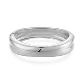 A silver-plated bangle featuring a smooth, curved design, showcasing elegance and modern style.