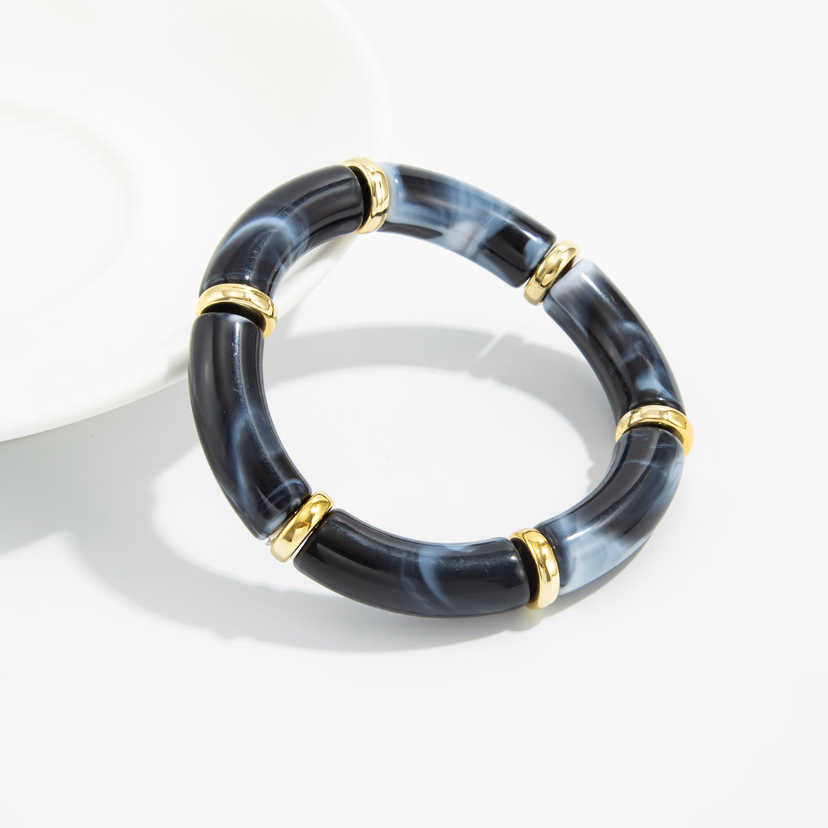 Black Resin and Goldtone Sequin Joint Stretch Bracelet, botanical inspired, lifestyle look