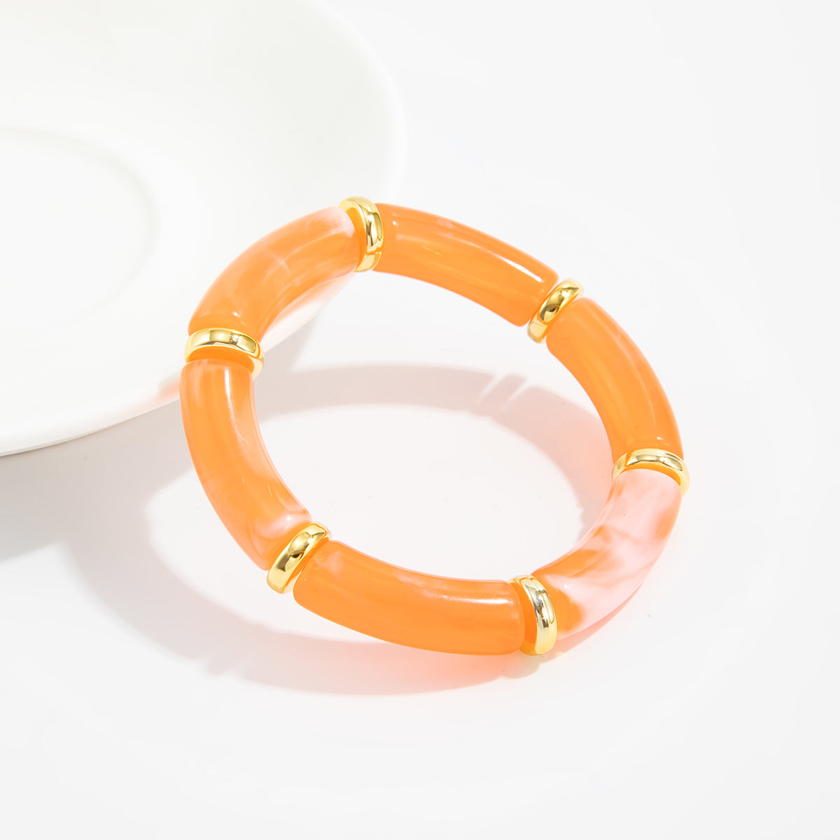 Orange Resin and Goldtone Sequin Joint Stretch Bracelet, dainty minimalist design, lifestyle look