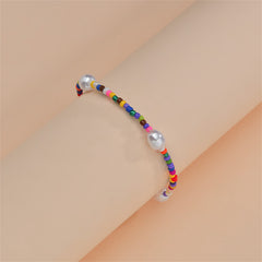 A stretch anklet adorned with howlite and pearls, featuring a lively mix of colors and textures in its design.