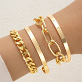 Elegant 18K gold-plated cuff set featuring three bracelets with chains and a charming heart detail.