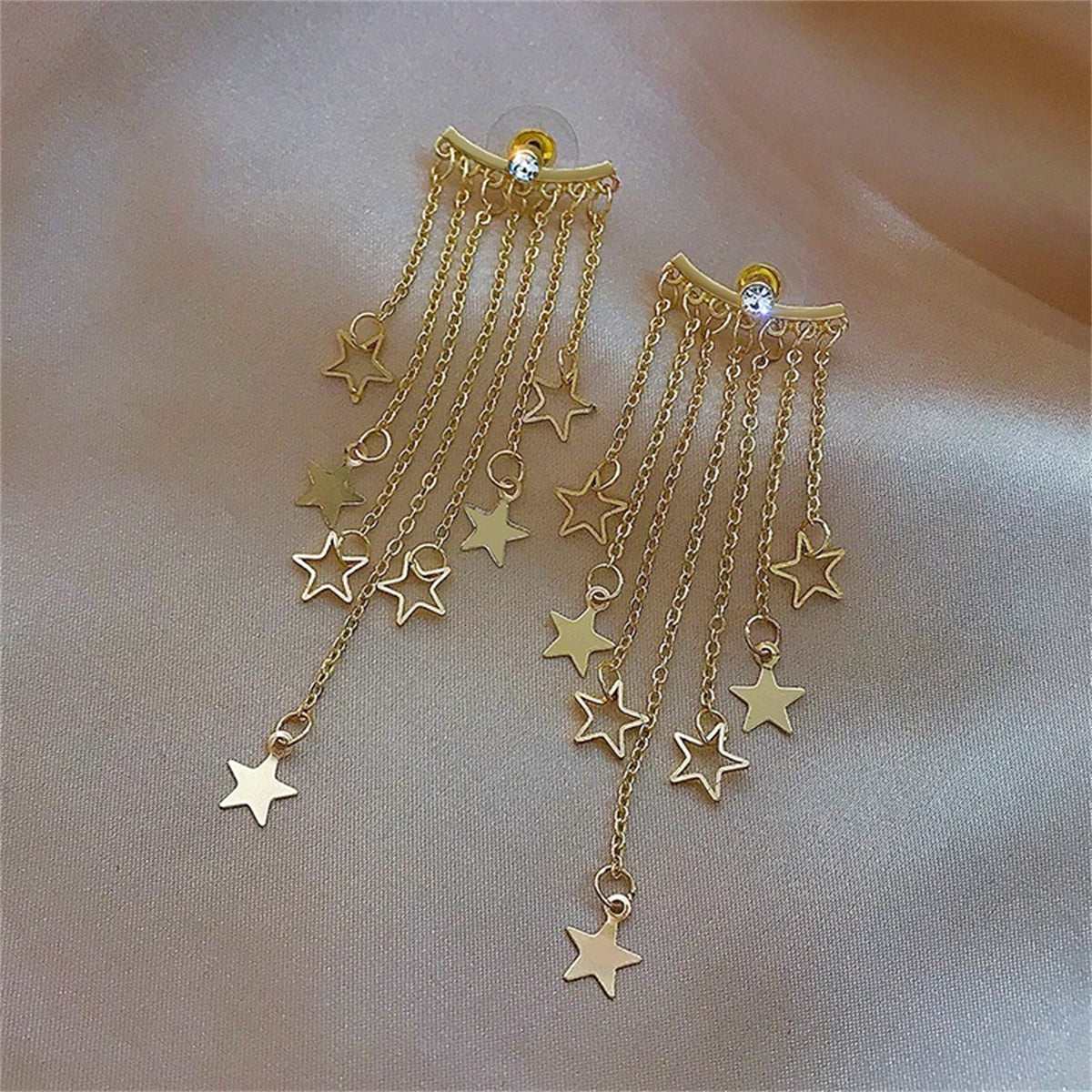 Cubic Zirconia and 18K Gold-Plated Star Tassel Ear Jackets, gold drop earrings for women, botanical inspired, detail close-up