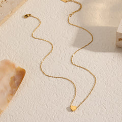 Delicate 18K gold-plated heart necklace on a small chain, a lovely accessory for expressing love and style.