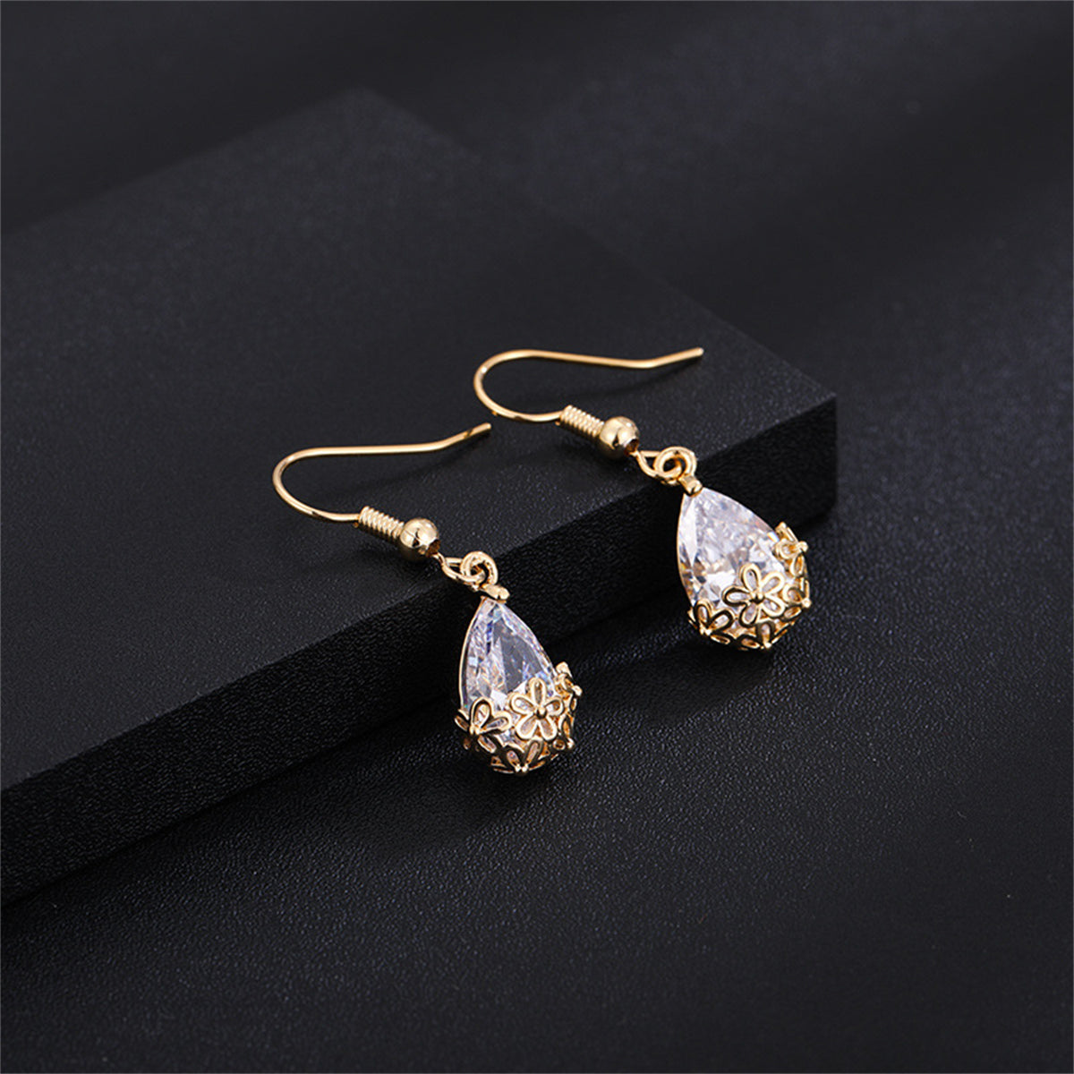 Elegant 18K gold-plated crystal floral drop earrings, perfect for adding a touch of glamour to any outfit.