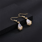 Elegant 18K gold-plated crystal floral drop earrings, perfect for adding a touch of glamour to any outfit.