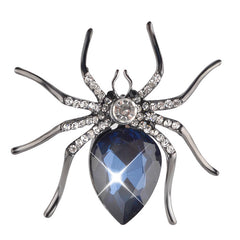 Unique blue spider brooch set with diamonds, offering a blend of elegance and playful charm in its design.