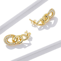 Dazzling 18K gold-plated earrings featuring diamond accents and clear cubic zirconia, perfect for any special occasion.