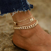 Elegant 18K gold-plated anklet featuring butterfly charms, perfect for adding a touch of whimsy to any outfit.