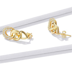 Stunning 18K gold-plated earrings with diamond details and clear cubic zirconia, ideal for elevating your style effortlessly.