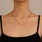 Two elegant 18K gold-plated necklaces featuring a charming bird pendant, perfect for adding a touch of sophistication.