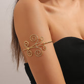 Elegant 18K gold-plated butterfly arm cuff featuring a stunning spiral design, perfect for any stylish occasion.