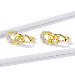 Chic gold tone drop earrings with diamonds and clear cubic zirconia, adding a touch of luxury to your jewelry collection.