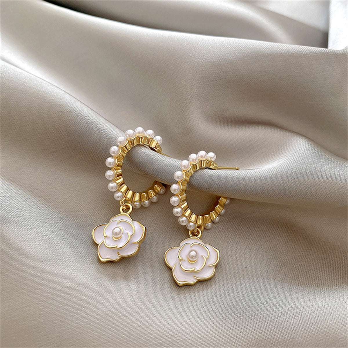 Pearl and White Enamel 18K Gold-Plated Flower Huggie Earrings, gold huggie earrings, detail close-up