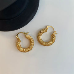Chic 18K gold plated hoop earrings showcasing a beautiful twisted design, ideal for elevating your outfit.