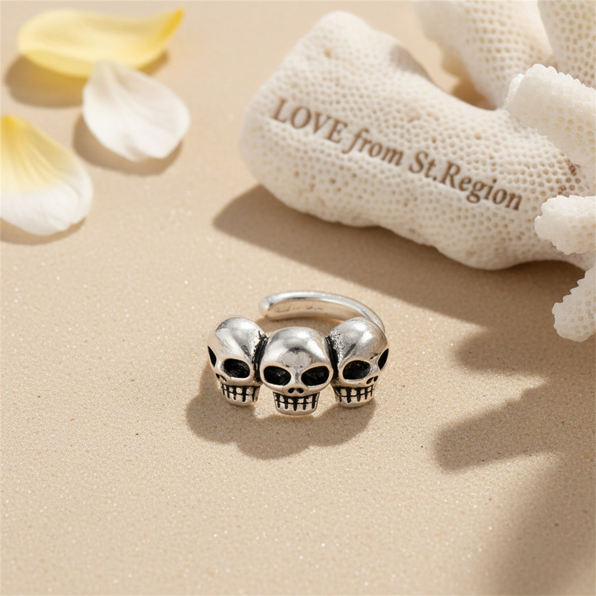 Silvertone Three-Skulls Ear Cuff