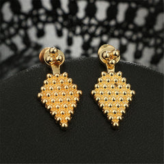 Chic 18K gold-plated ear jackets in a diamond shape, enhanced with small beads for a fashionable statement.