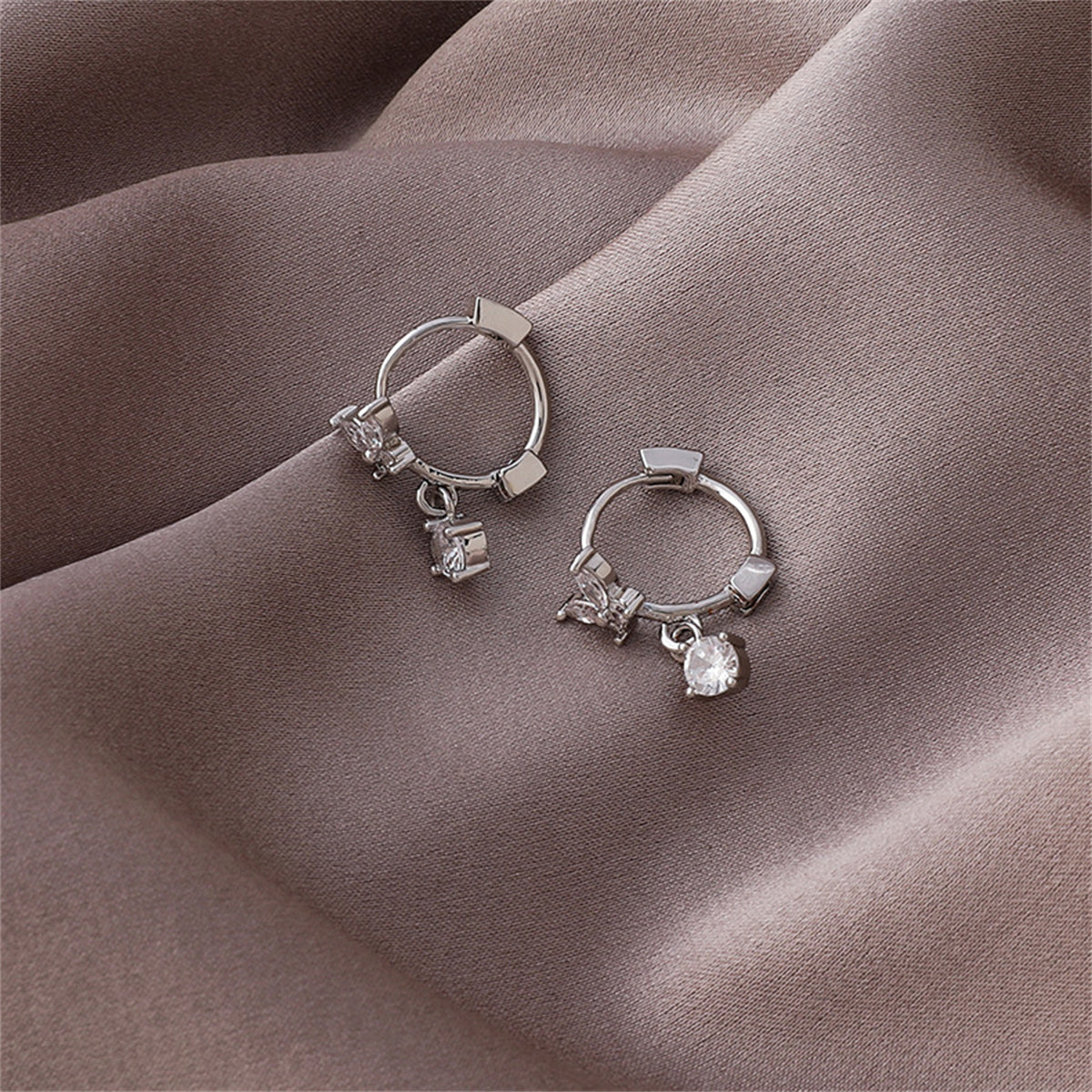 Cubic Zirconia and Silver-Plated Butterfly Huggie Earrings, silver huggie earrings, dainty minimalist design, lifestyle look