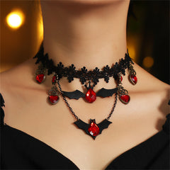 Black and red choker necklace featuring bats and hearts, perfect for Halloween-themed outfits.