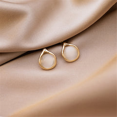 Exquisite 18K gold-plated earrings featuring peach cat's eye, perfect for elevating any outfit.