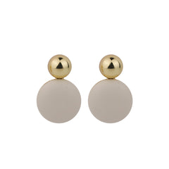 Gold and white round drop earrings made of man-made leather, beautifully emphasizing their chic appeal.