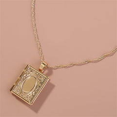 Exquisite 18K gold-plated locket containing a small book, a perfect keepsake for your most cherished stories.