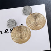 Elegant 18K gold-plated and silver-plated woven disk drop earrings, showcasing a stunning circular design.