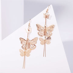 Stunning 18K gold-plated double butterfly drop earrings featuring long chains, ideal for a chic and stylish look.