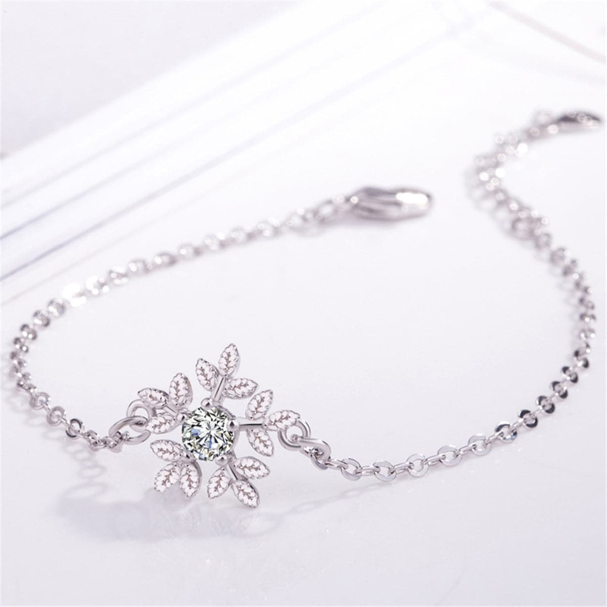 Cubic Zirconia and Silver-Plated Snowflake Charm Bracelet, silver bracelet for women, lifestyle look