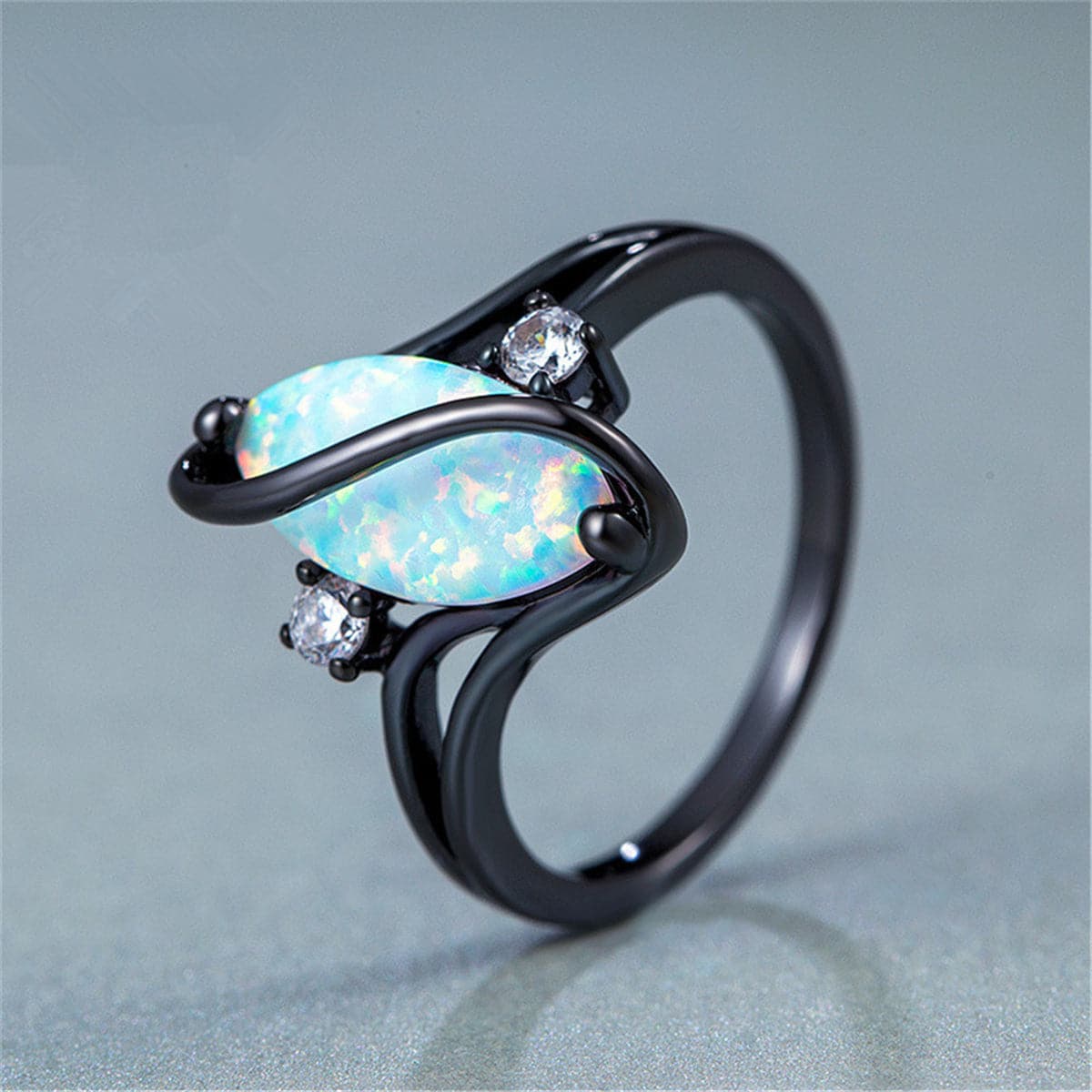 Blue Opal & cubic zirconia Pear-Cut Twisting Ring - streetregion