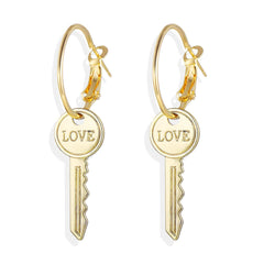 Stunning 18K gold-plated 'Love' key earrings, a chic accessory that symbolizes love and elegance.