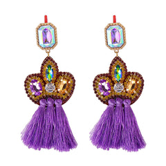 Stunning purple tassel earrings with crystal and bead details, designed to elevate your accessory game.