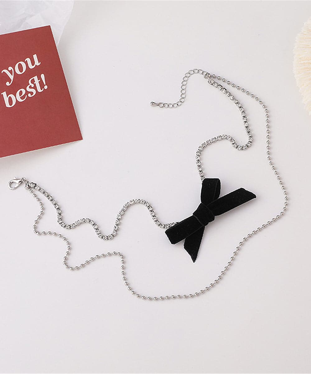 Cubic Zirconia and Silver-Plated Bow Layered Necklace, silver pendant necklace for women, styled look