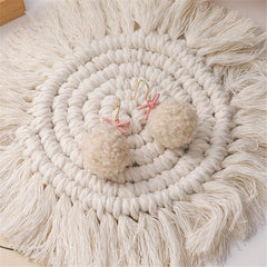 Fashionable 18K gold-plated earrings showcasing fluffy white pom poms and a cute pink bow, ideal for a stylish statement.