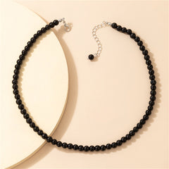 Stylish black necklace made of quartz beads, accented with a silver clasp.