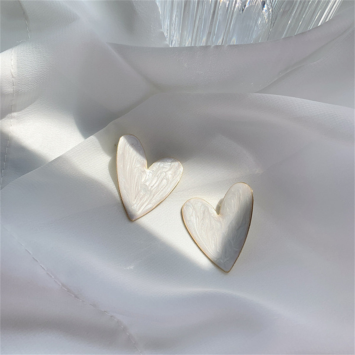 Enamel and 18K Gold-Plated Heart Stud Earrings, gold stud earrings for women, dainty minimalist design, detail close-up