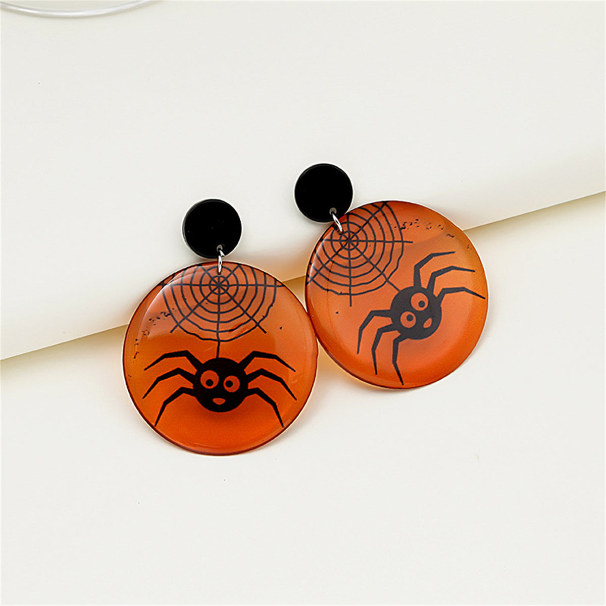 Black and Orange Spider Web Drop Earrings, drop earrings for women, dainty minimalist design, detail close-up