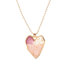 Elegant light pink heart pendant necklace with a gold-plated chain, a charming accessory for any occasion.