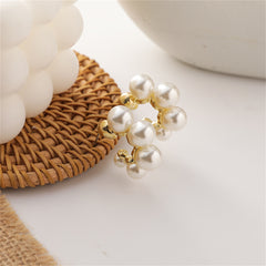 Beautiful pearl cluster earrings designed with 18K gold-plated C-shape huggies, ideal for a stylish accessory.