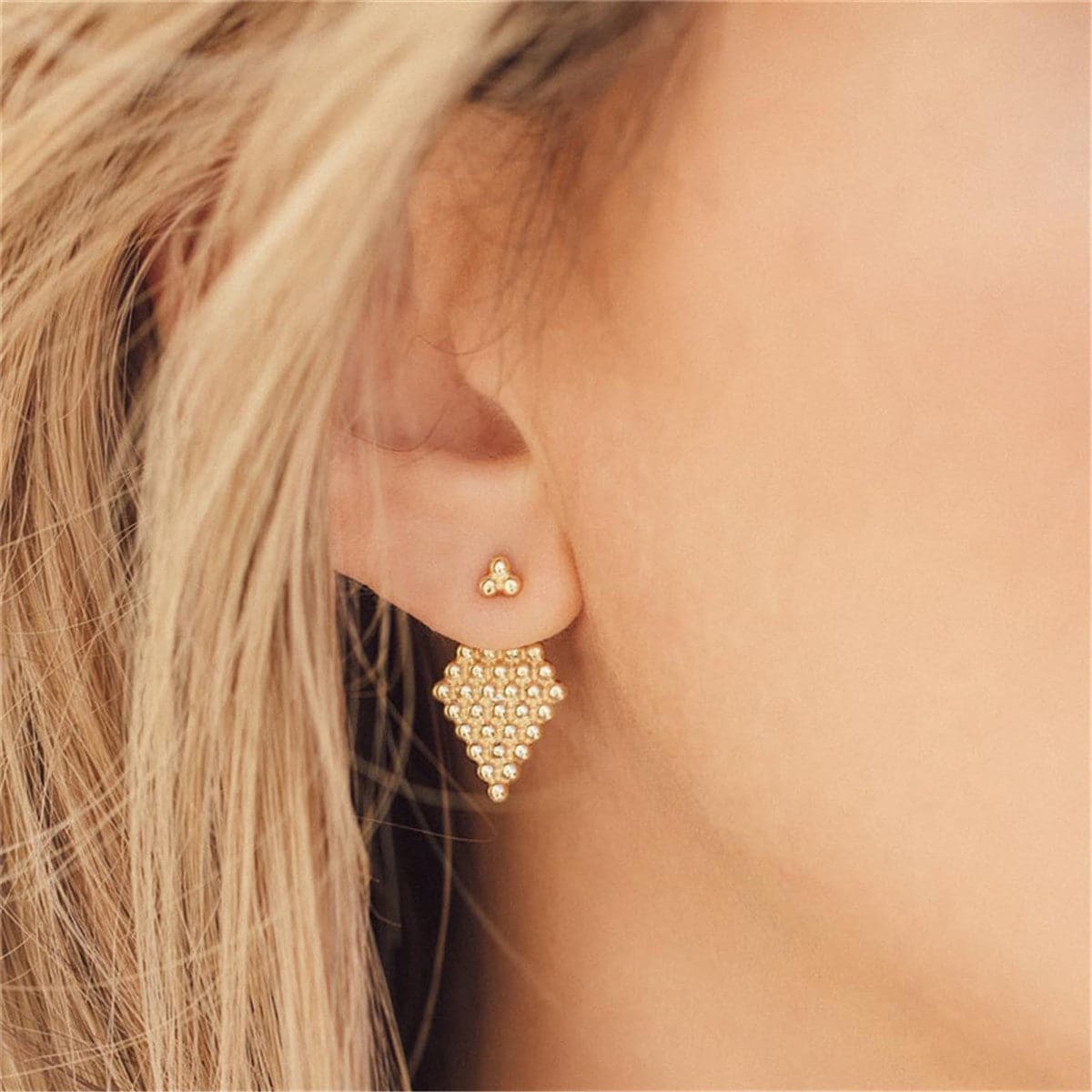 Elegant 18K gold-plated diamond-shaped ear jackets adorned with delicate small beads for a stunning look.