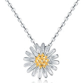 Elegant white and yellow daisy pendant with a gold center, crafted in 18K gold-plated sterling silver for a stunning look.