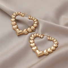 Elegant 18K gold-plated heart hoop earrings, combining charm and sophistication for any jewelry collection.