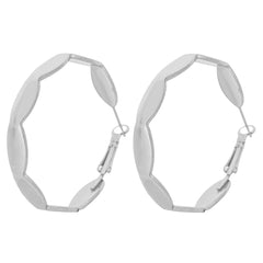 Two silver hoop earrings with a wave design, elegantly curved for a modern look.