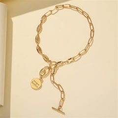 Beautiful 18K gold-plated lariat necklace showcasing a large chain and a disc pendant saying 'You Are My Sunshine'.