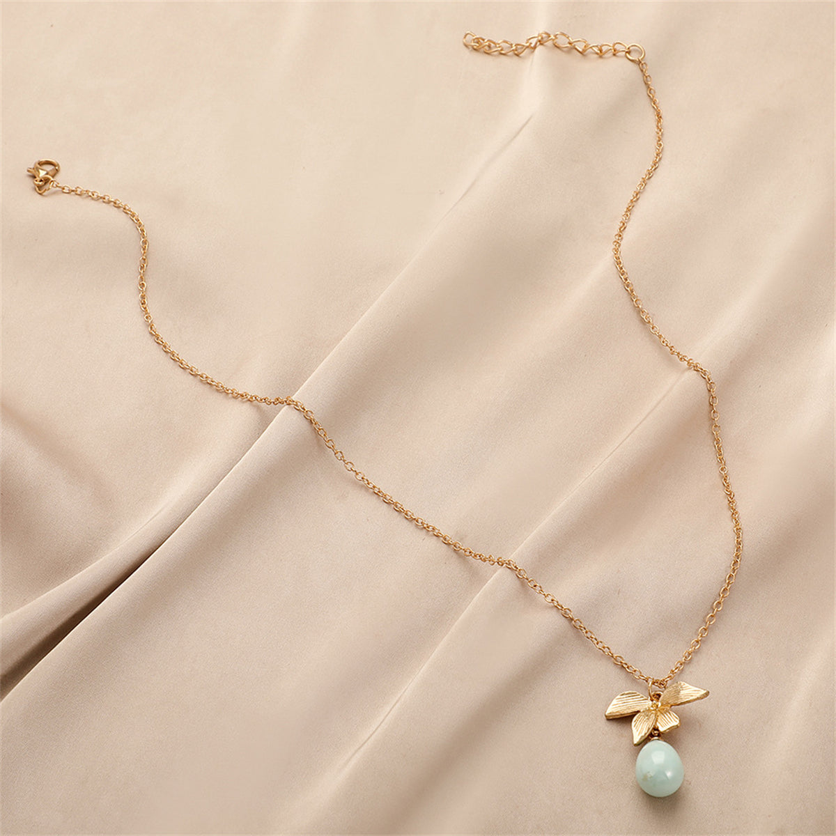 Pearl and 18K Gold-Plated Leaf Pendant Necklace, gold pendant necklace for women, everyday style, detail close-up