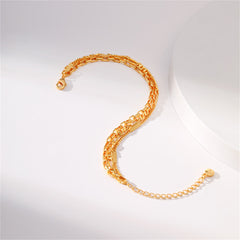 An 18K gold-plated tri-chain bracelet with a clasp and two distinct links, showcasing a refined style.